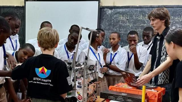 Showcasing the Team USA FGC robot to students at Christ-Roi