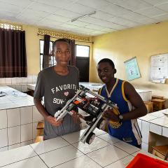 Two students at Saint André just after completing their drivetrain