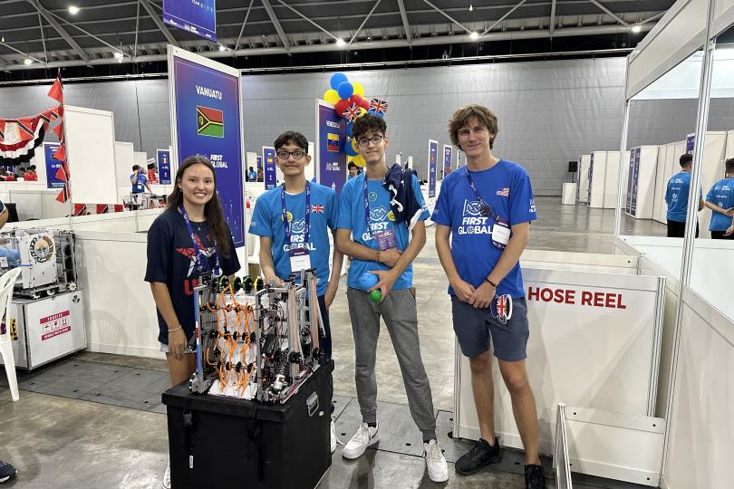 Team Great Britain donating their robot