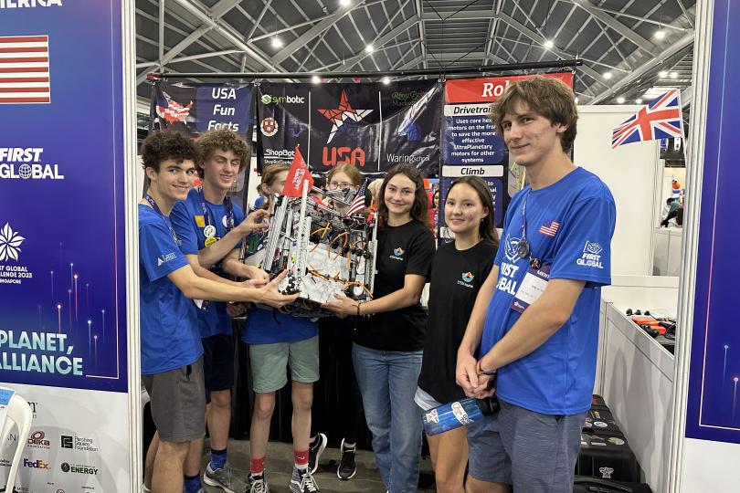 Team USA donating their robot