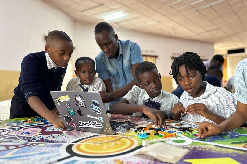 Students at Eagle Spirit Academy building mission models for the FLL competition