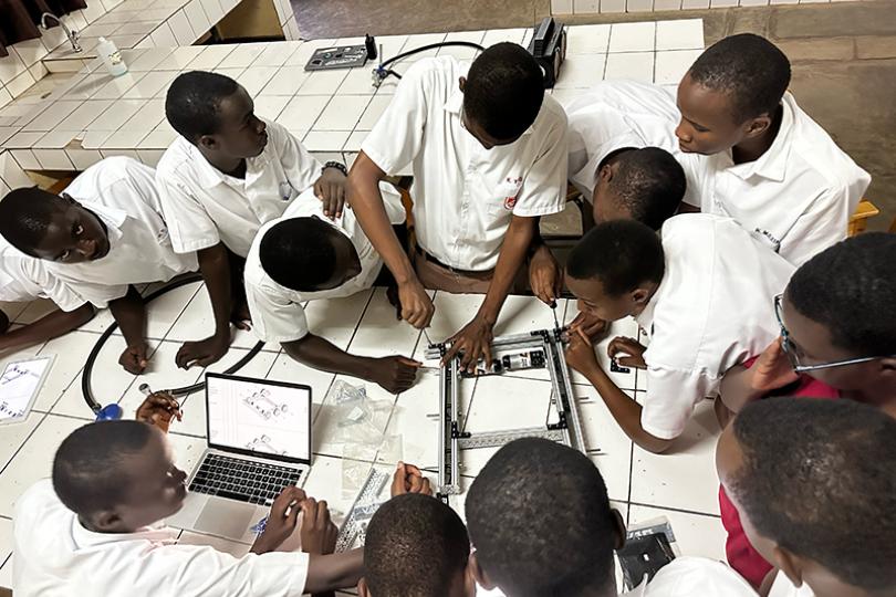 Students at Saint André assembling their drivetrain