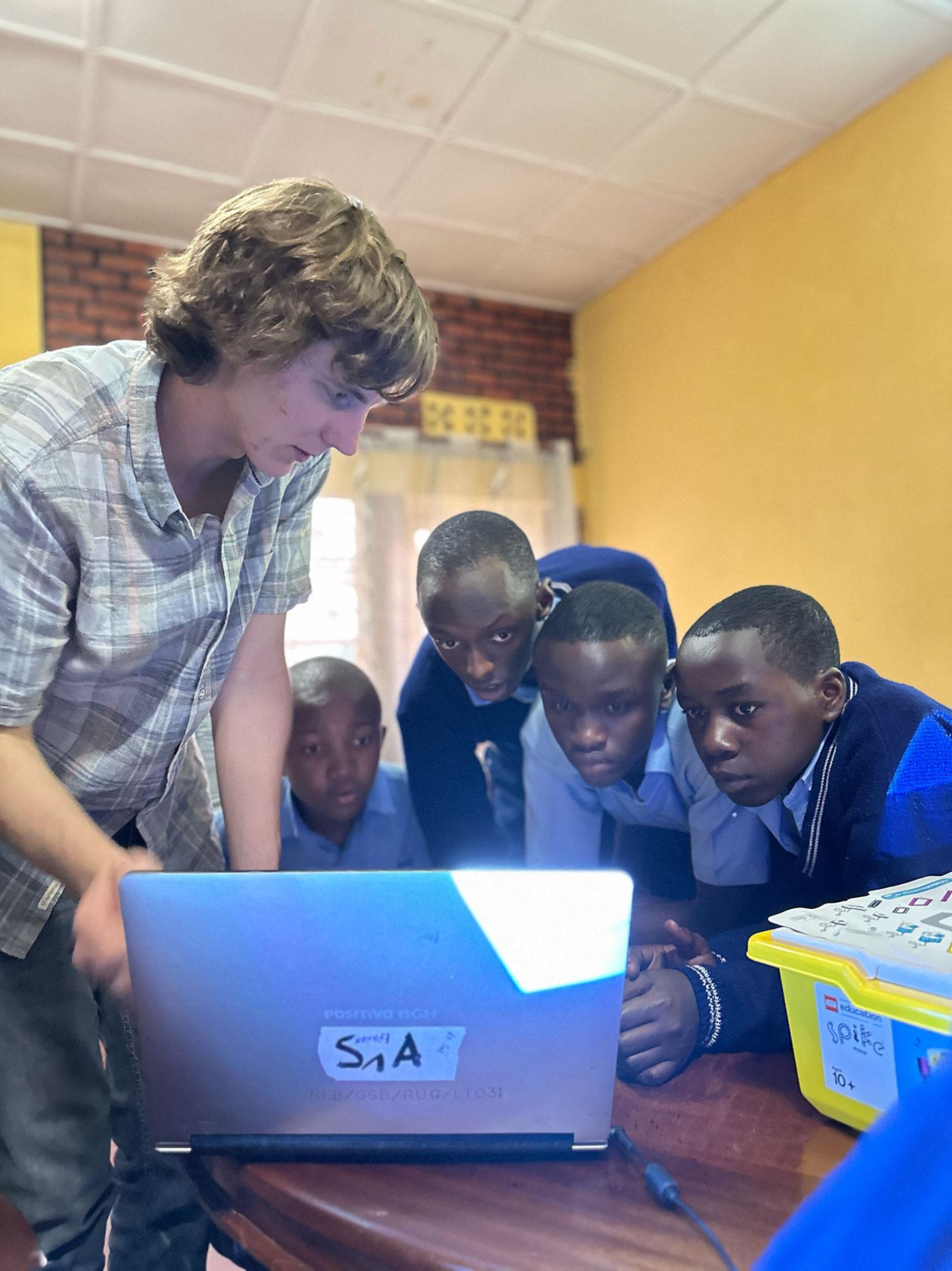 Teaching programming to students at Groupe Scolaire Rugando